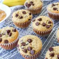 Close-up angle of baked Peanut Butter Banana Muffins with Chocolate Chips - Hostess At Heart