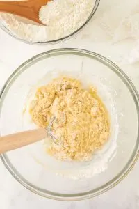 Mixing concha bread dough in a glass bowl. Hostess At Heart