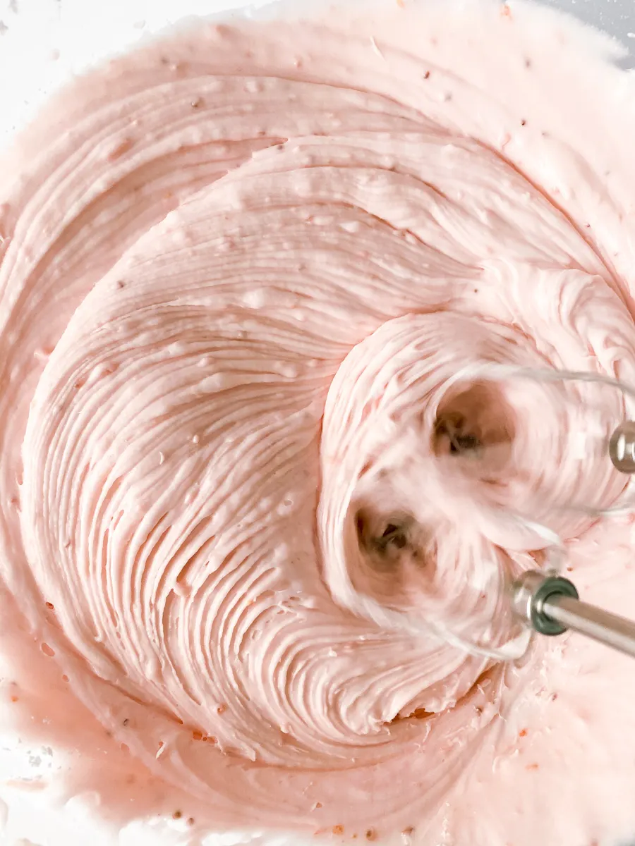 A mixer beating Strawberry Icing - Hostess At Heart