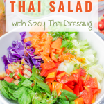 Angled view of a chopped salad dressed with vinaigrette - Hostess At Heart