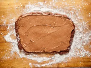 Chocolate filling spread over rolled chocolate bread dough - Hostess At Heart