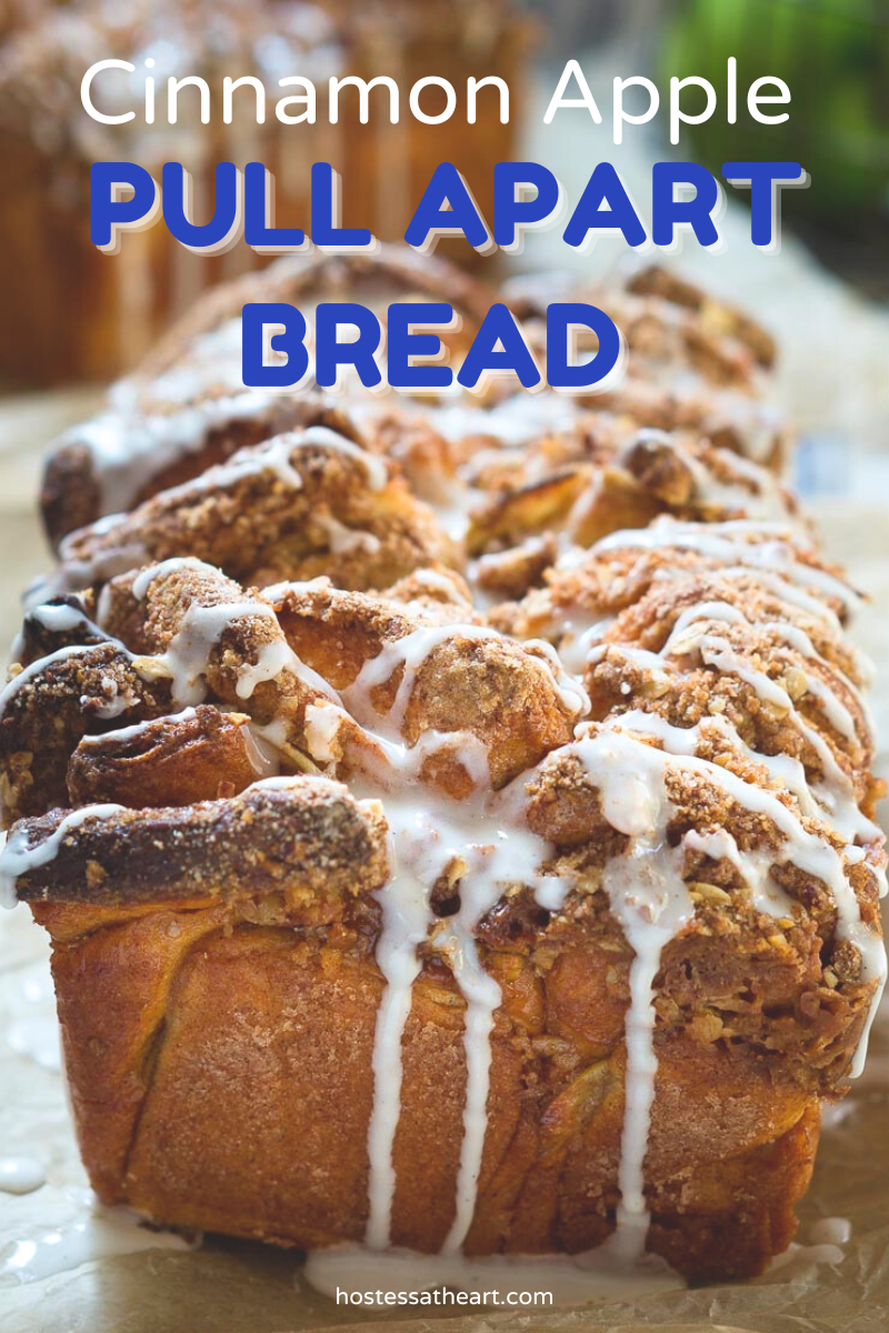 Cinnamon Apple Pull-Apart Bread topped with Streusel and dripping sugar glaze. Hostess At Heart