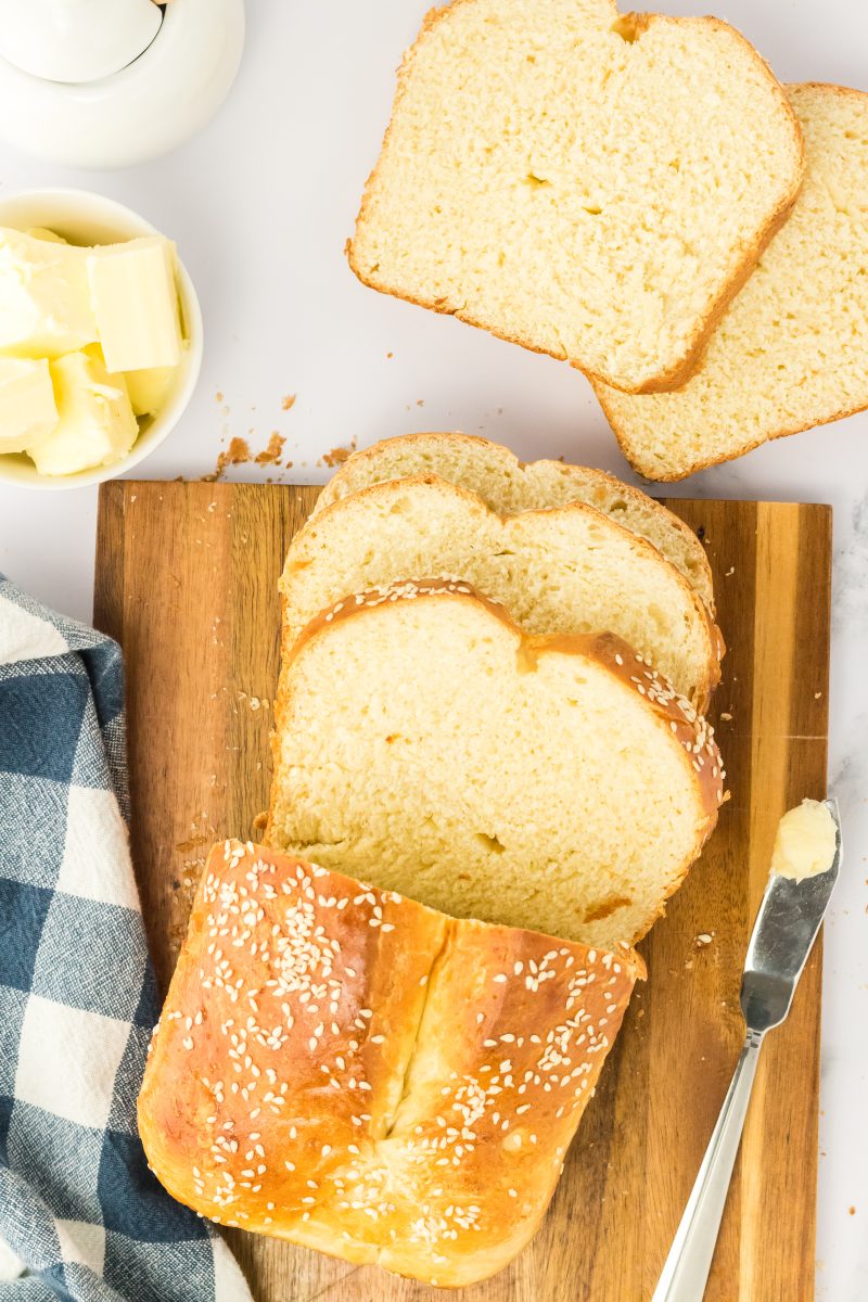 Top down view of sliced loaf of sesame bread. Hostess At Heart