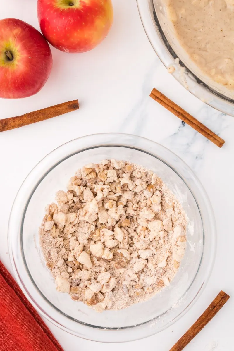 Top down view of a bowl filled with crumble topping - Hostess At Heart