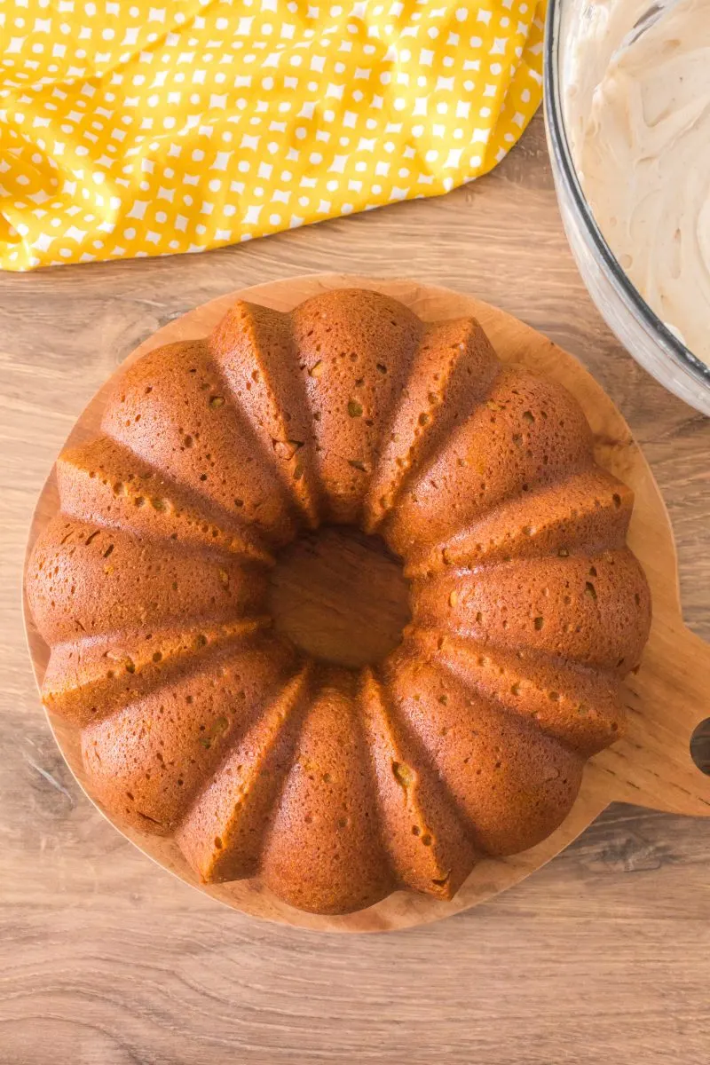 Top down view of a baked golden brown Pumpkin bundt cake - Hostess At Heart