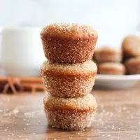 A stack of three cinnamon sugar coated mini homemade donut muffins. Hostess At Heart