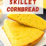 Two wedges of cornbread stacked next to each other on a plate - Hostess At Heart