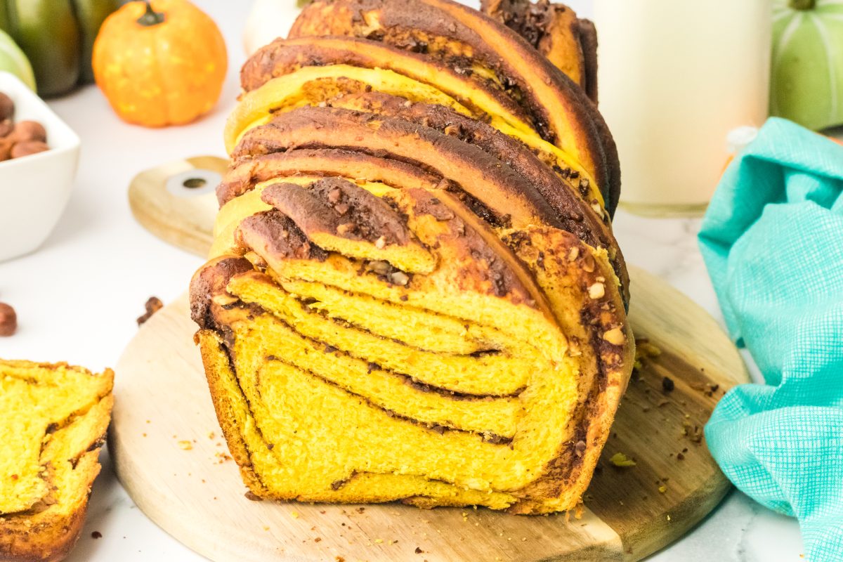 Front view of a loaf of pumpkin babka with ribbons of chocolate running through it - Hostess At Heart