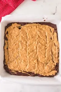 Brownie batter topped with a peanut butter topping - Hostess At Heart