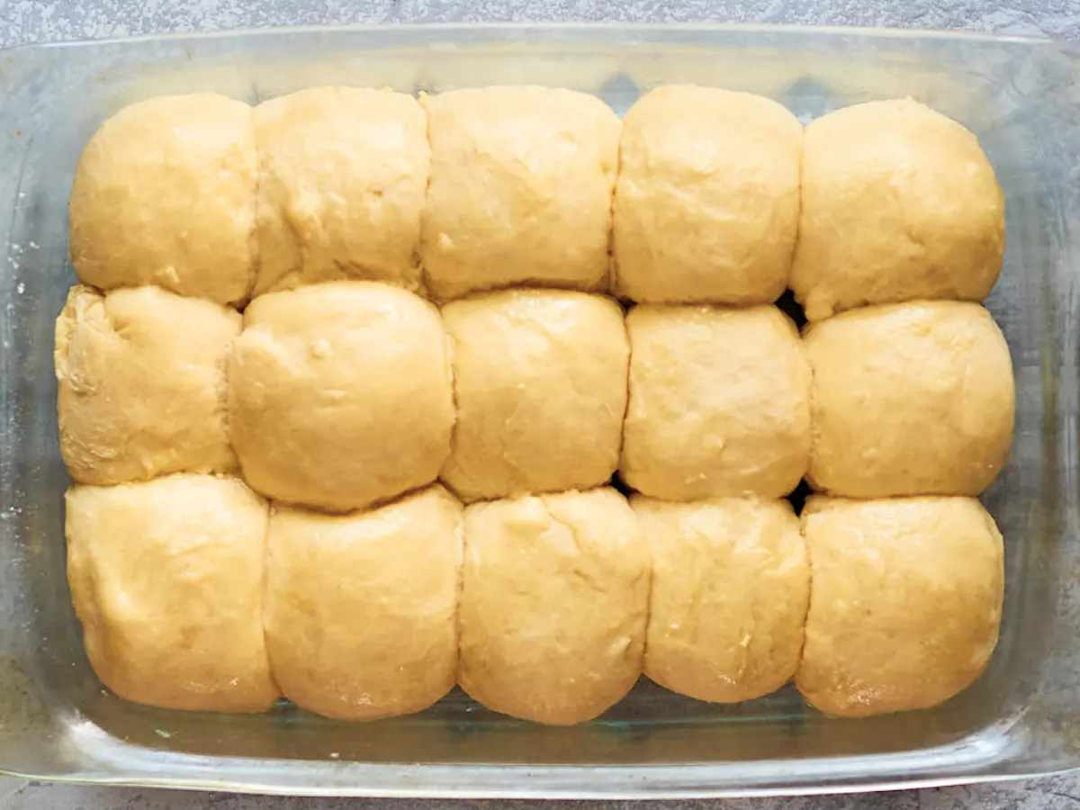 Pan of risen dough rolls - Hostess At Heart