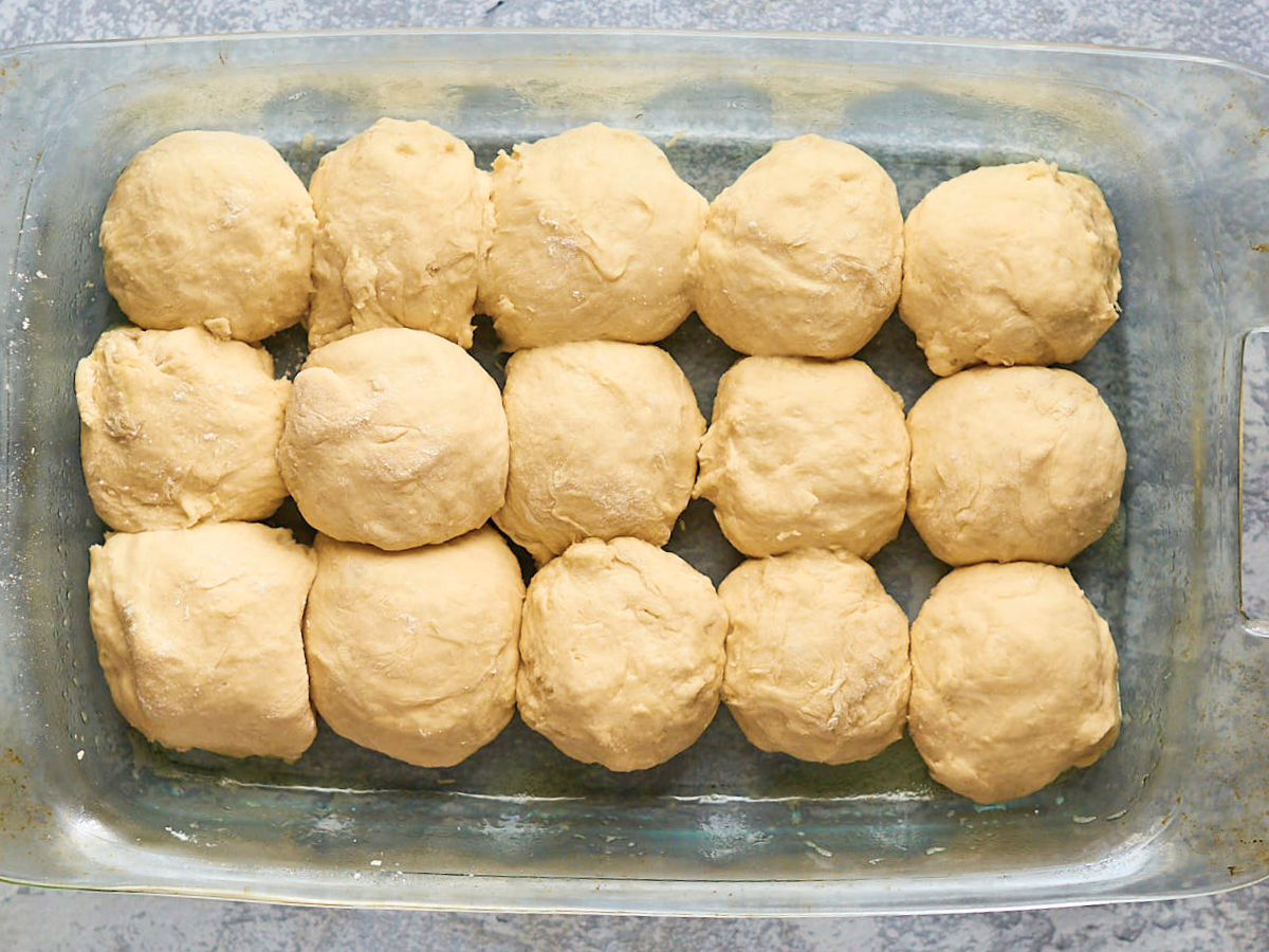 Hawaiian Bread Rolls shaped dough balls in a pan. Hostess At Heart