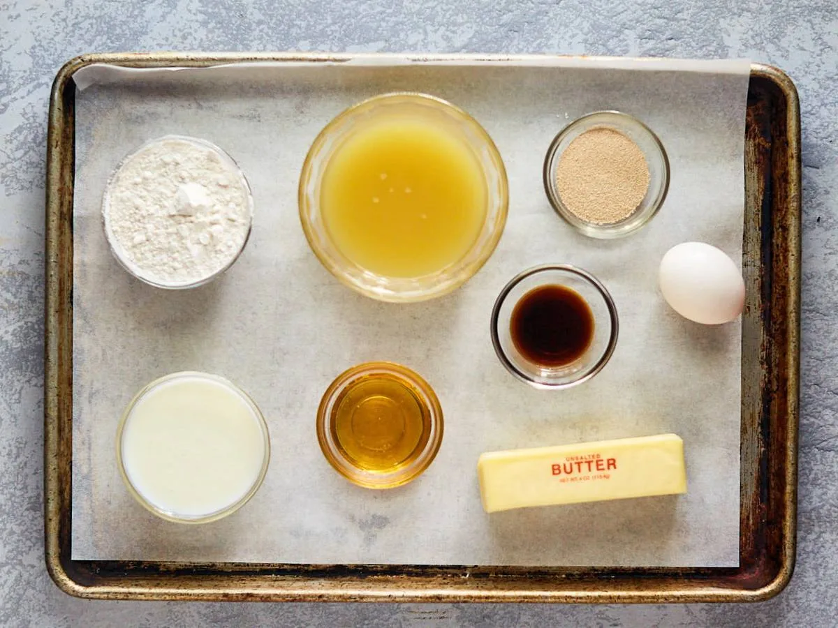 Ingredients used to make Kings Hawaiian Bread Rolls including butter, honey, vanilla, egg, Flour, yeast, buttermilk, and pineapple juice. Hostess At Heart