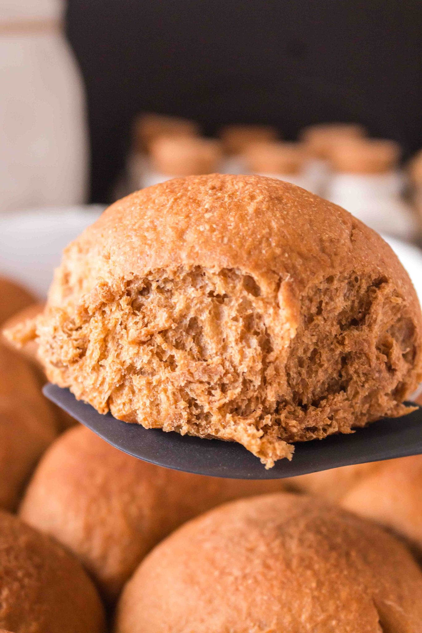 Top down view of shaped bread rolls brushed with butter - Hostess At Heart