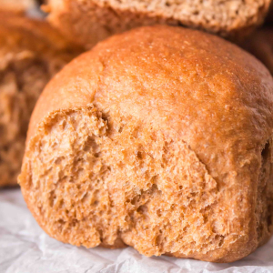 Sideview of a beautifully baked Molasses Brown Bread Roll - Hostess At Heart