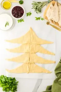 Top down view of crescent rolls aligned together to braid - Hostess At Heart