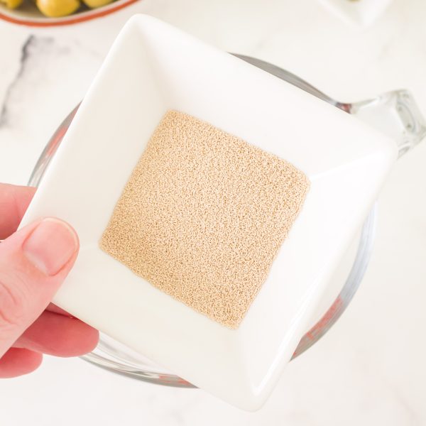 A small bowl of granulated yeast. Hostess At Heart