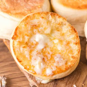 A toasted English Muffin topped with melted butter - Hostess At Heart