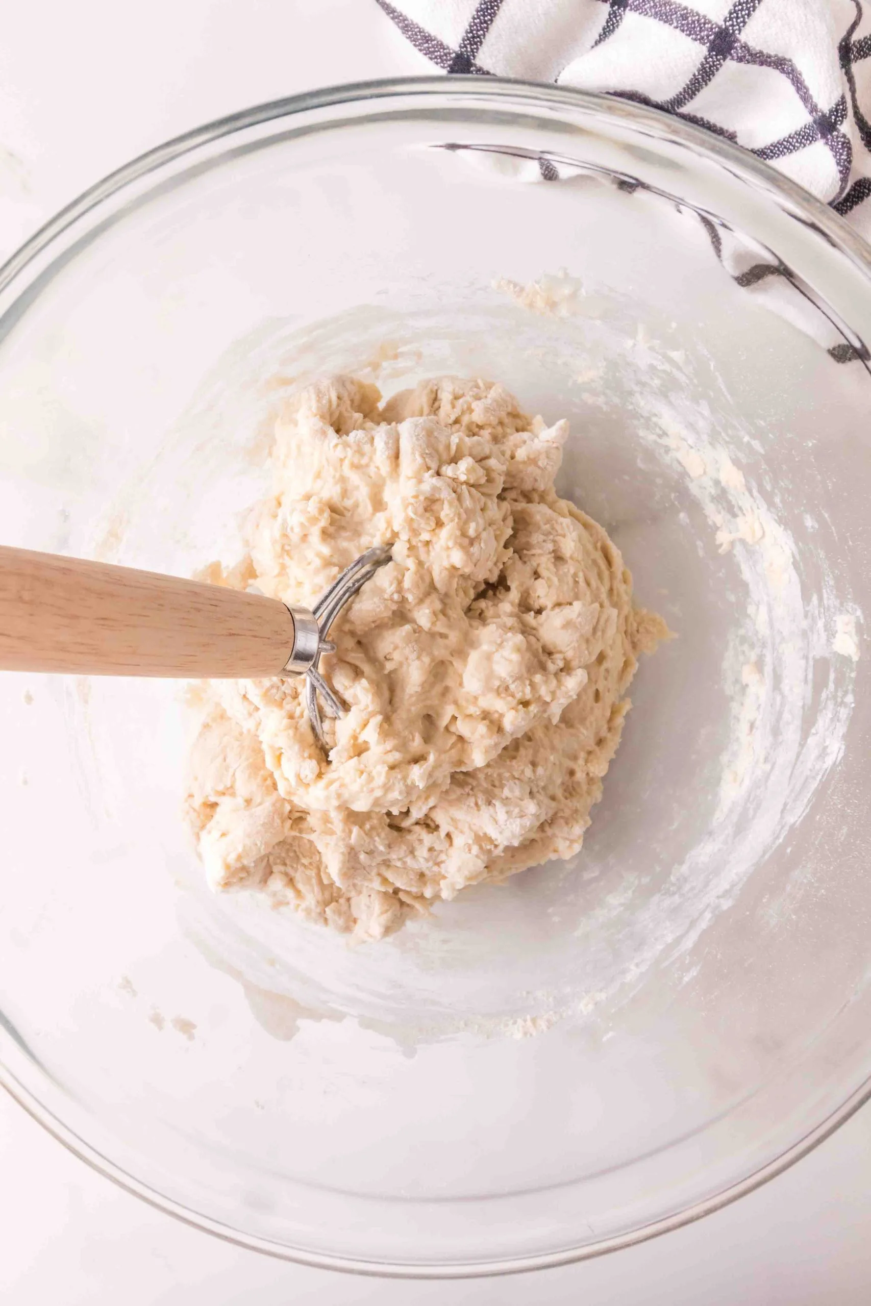 A Danish whisk mixing homemade bread dough - Hostess At Heart