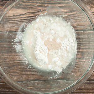 Water, flour, and yeast in a bowl - Hostess At Heart
