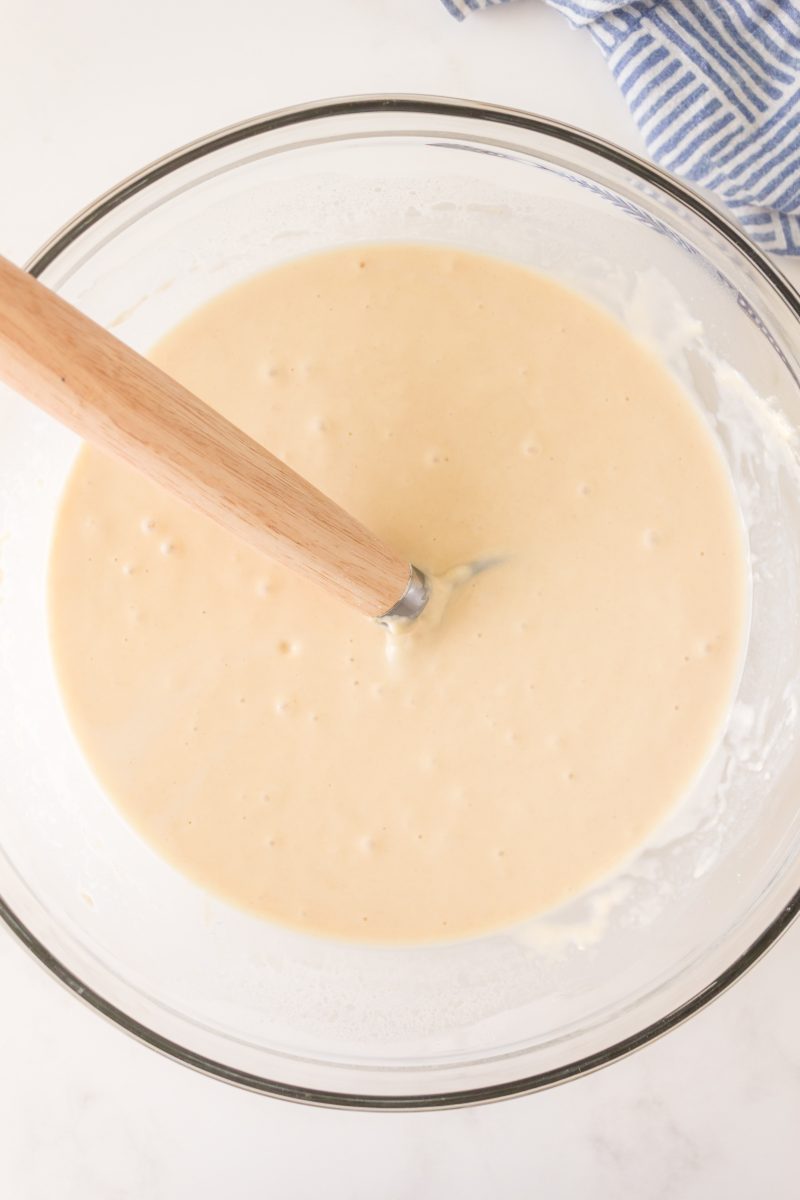 Top down view of a bowl filled with sourdough starter pancake batter - Hostess At Heart