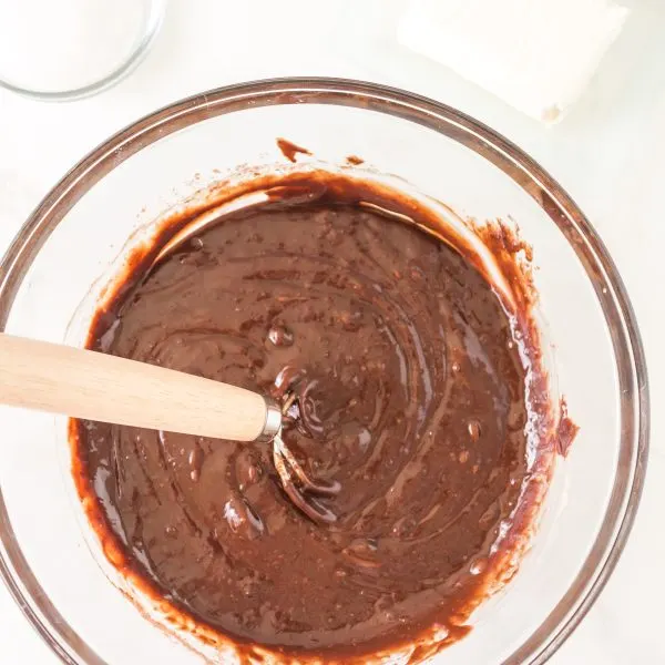 Smoothly mixed chocolate batter in a mixing bowl - Hostess At Heart