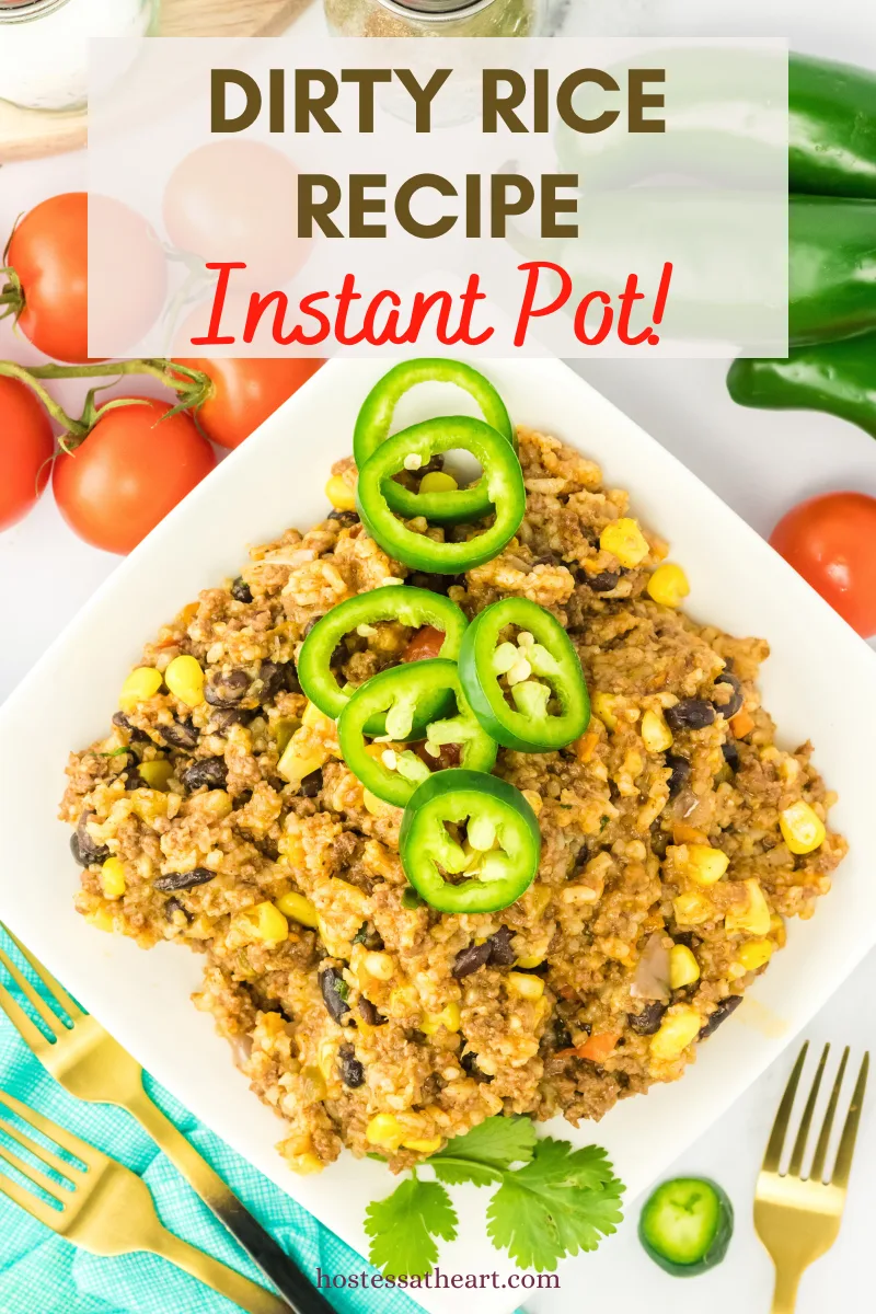 Top down view of a serving dish filled with instnat pot dirty rice recipe loaded with ground beef, corn, black beans, tomatoes and spice garnished with fresh jalapeno slices - Hostess At Heart