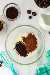 Mixing bowl filled with cream, cocoa, and instant coffee. Hostess At Heart