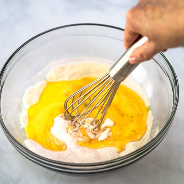 Whipped egg whisked into custard dry ingredients - Hostess At Heart