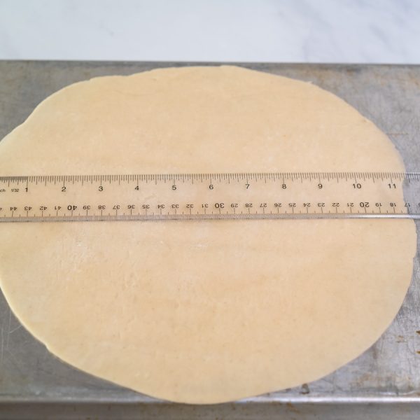 Pie crust rolled into an 11-1/2 inch circle and placed on the back of a baking sheet. Hostess At Heart