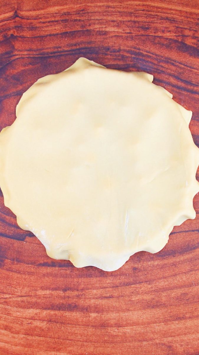 Top crust laying over a fruit pie - Hostess At Heart