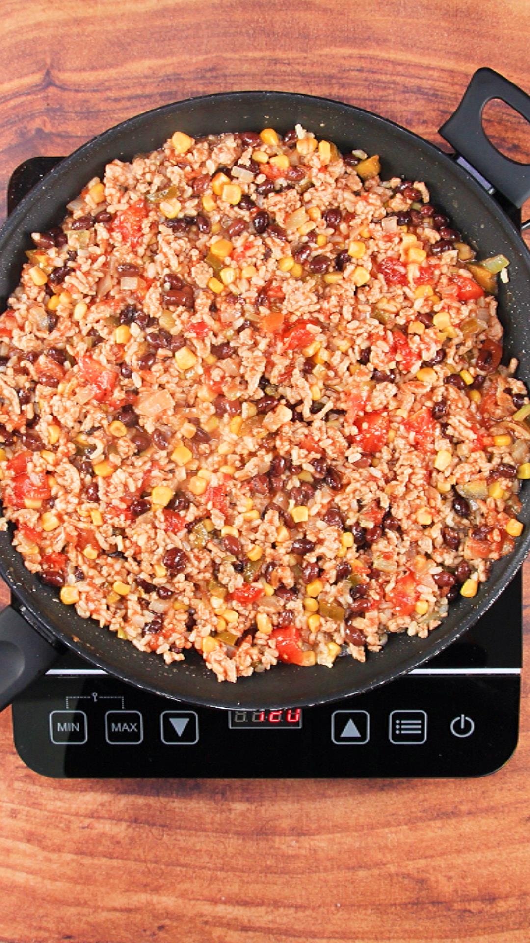 Green Chili Pork Filling in a skillet - Hostess At Heart