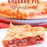 Sideview of a slice of strawberry rhubarb pie with the juices surrounding the slice on a plate - Hostess At Heart