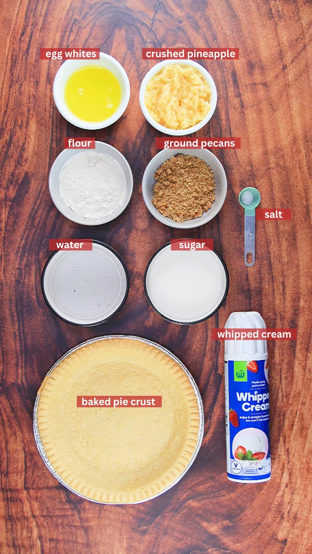 Ingredients for a Angel Food Pie including a baked pie crust, crushed pineapple, crush pecans, whipped cream, sugar, water, flour, and egg whites. Hostess At Heart