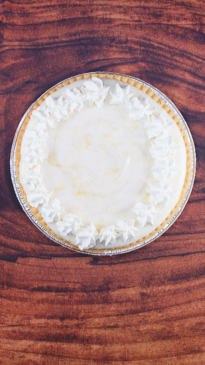 Top down view of angel food pie decorated with whipped cream stars - Hostess At Heart