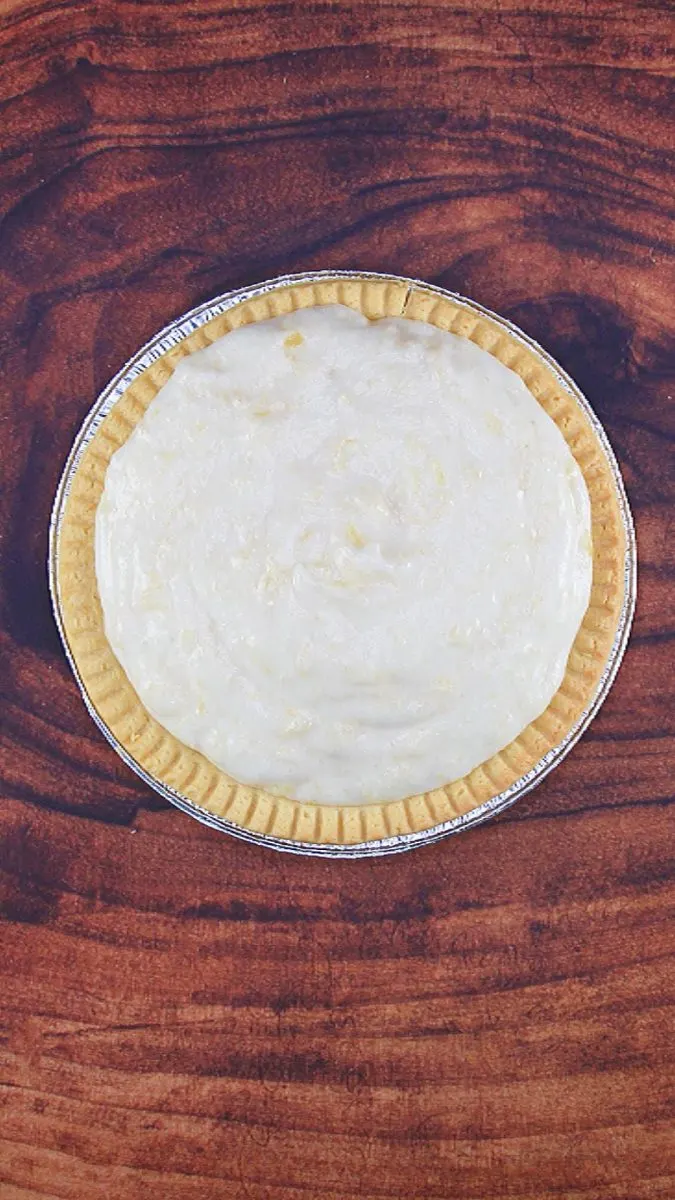 Top down view of a Pie shell filled with Angel Pie Filling - Hostess At Heart
