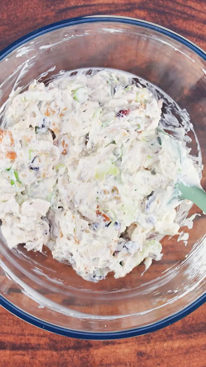 A bowl with chicken salad made with Greek yogurt mixed together. Hostess At Heart