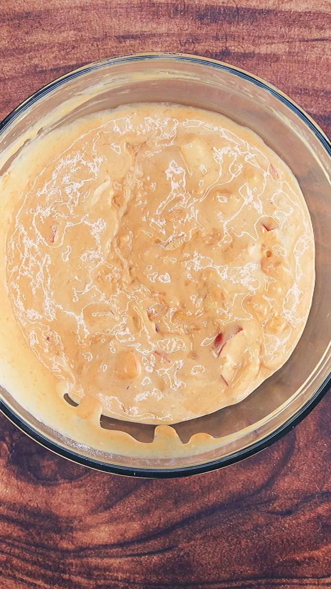 Top down view of a bowl filled with mixed caramel apple salad - Hostess At Heart