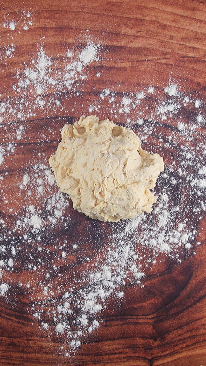 A shaggy pita bread dough ball.