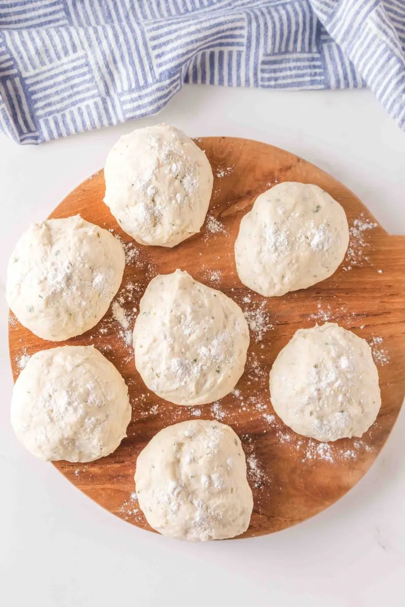 Dough split into ten equal pieces and rolled into balls to make flatbread. Hostess At Heart