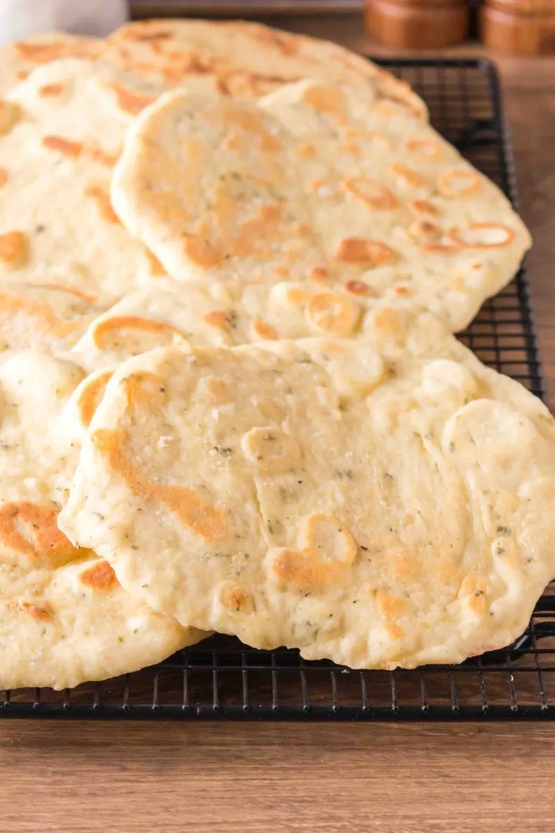 Pieces of flatbread cooling on a cooling rack. Hostess At Heart