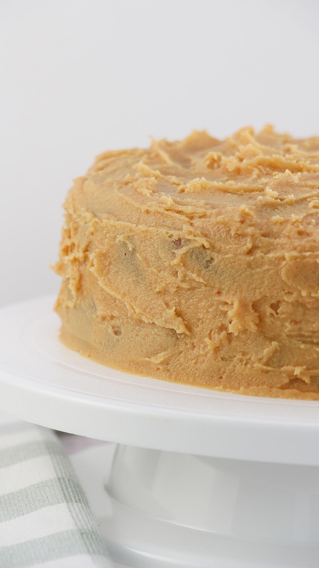 Frosted homemade spice cake with peanut butter frosting.