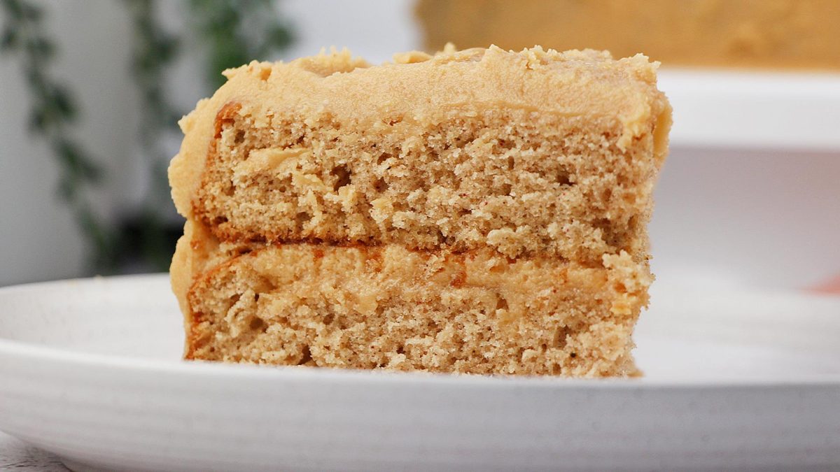 Slice of cake from our Old Fashioned Spice Cake Recipe on a plate, close-up.