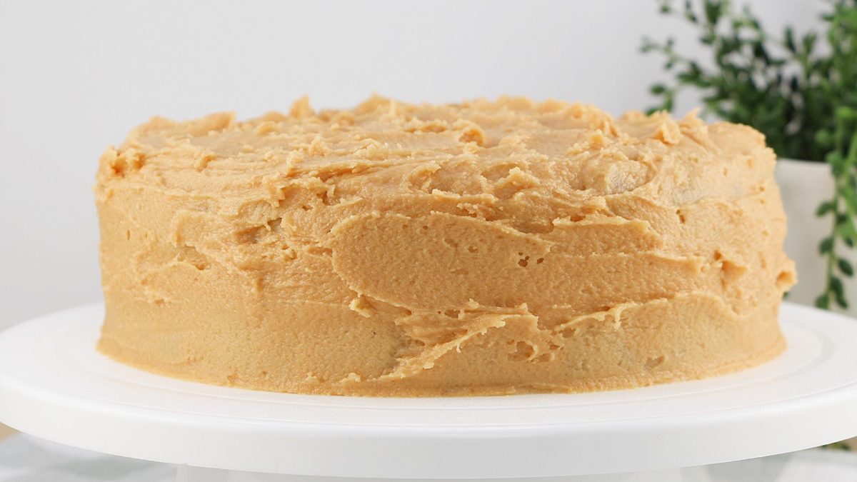 Close up of old fashioned spice cake with peanut butter frosting.