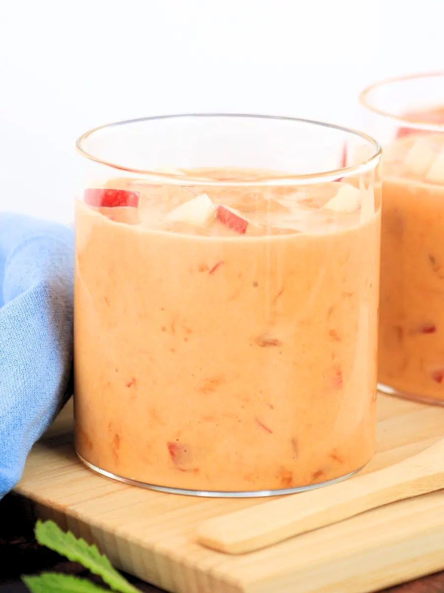 Sideview of a glass jar filled with instant butterscotch and apple salad - Hostess At Heart