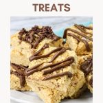 Angled view of peanut butter rice crispy treats drizzled with chocolate on a plate for Pinterest. Hostess At Heart