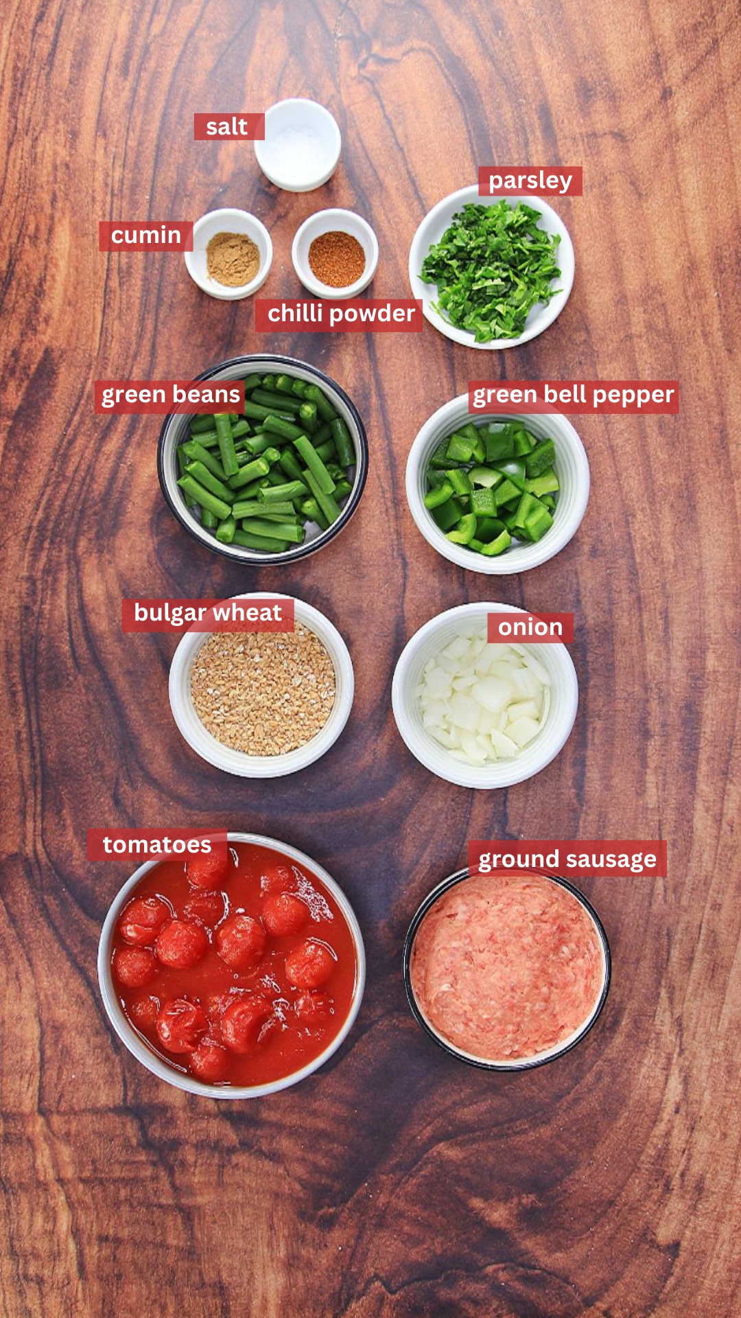 Ingredients: salt, cumin, chili powder, parsley, green beans, green bell pepper, bulgar wheat, onion, tomatoes, ground sausage. 