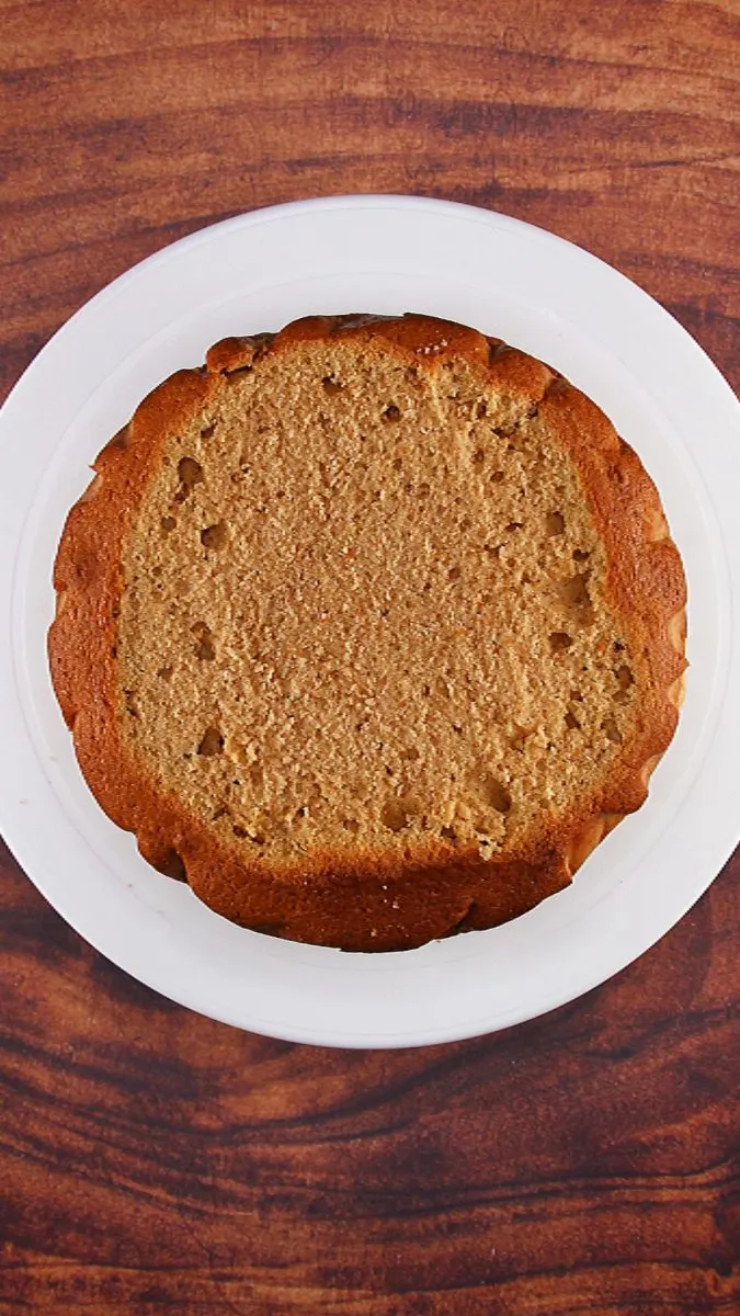 Top down view of a round cake that the dome has been sliced off creating a flat top. Hostess At Heart