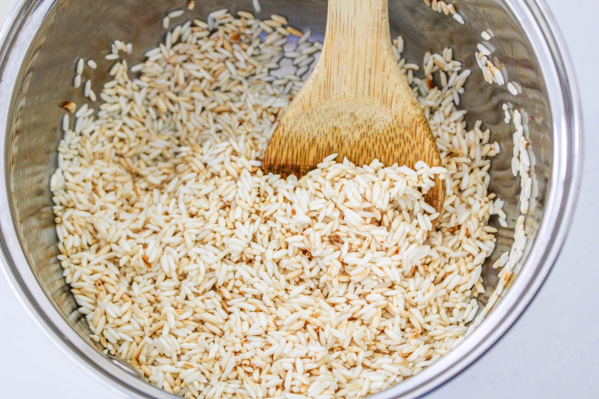 A saucepan filled with browned long-grain rice - Hostess At Heart