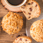 Top down view of cappuccino muffins filled with chocolate chips and topped with streusel. Hostess At Heart