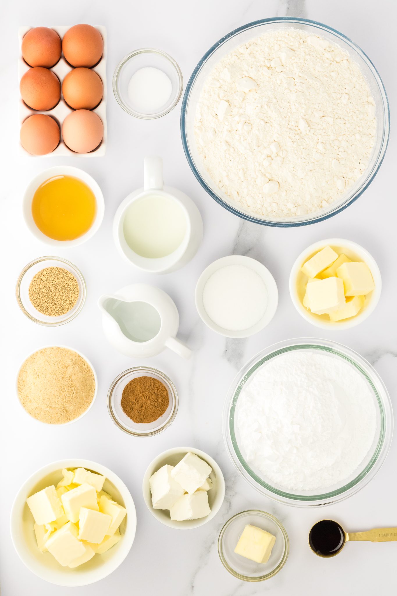 Ingredients: egg, salt, flour, honey, milk, yeast, sugar, cinnamon, butter, brown sugar, cream cheese, vanilla, powdered sugar.
